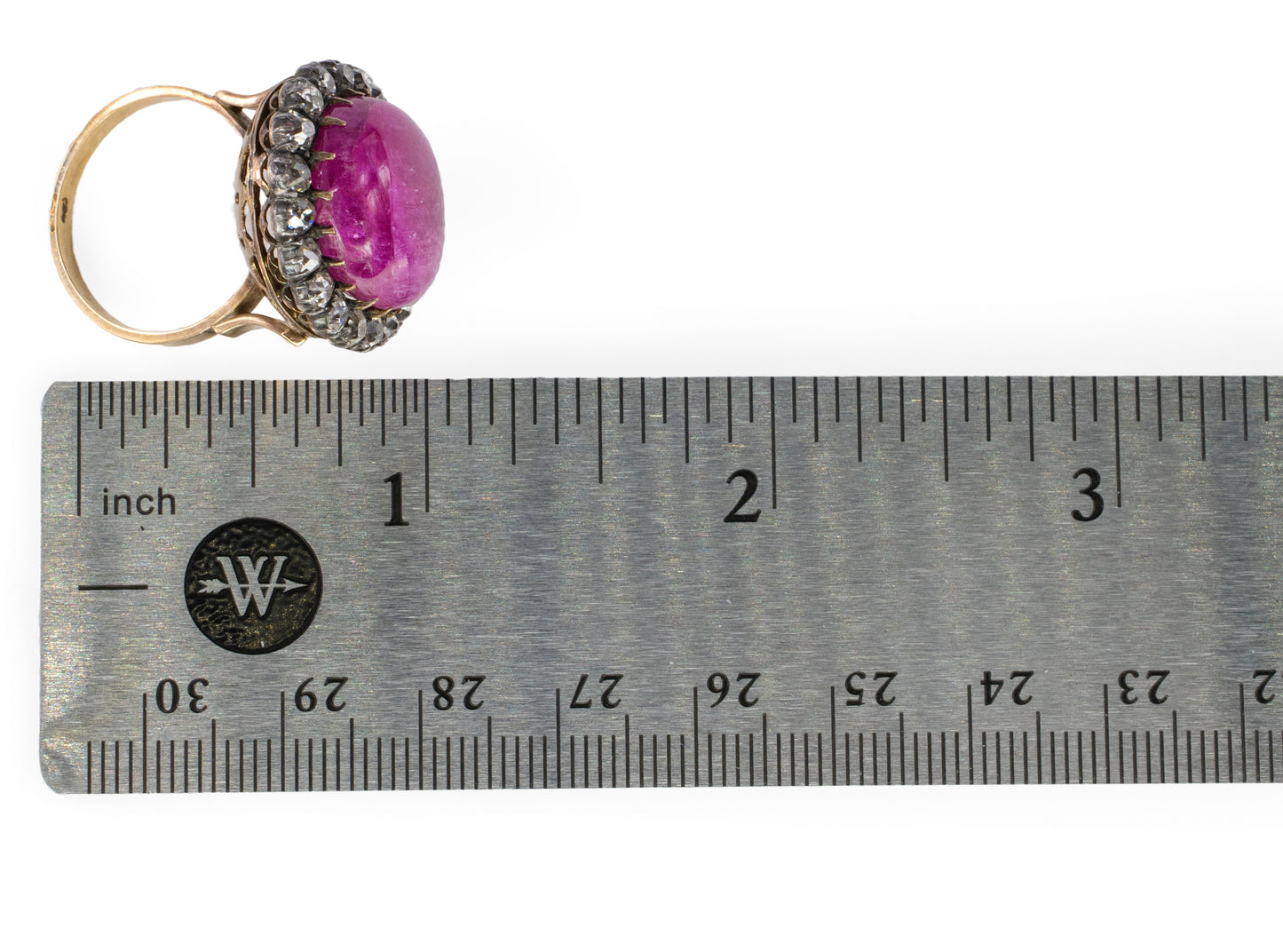 Large Cabochon Ruby and Old Mine Diamond Halo Ring