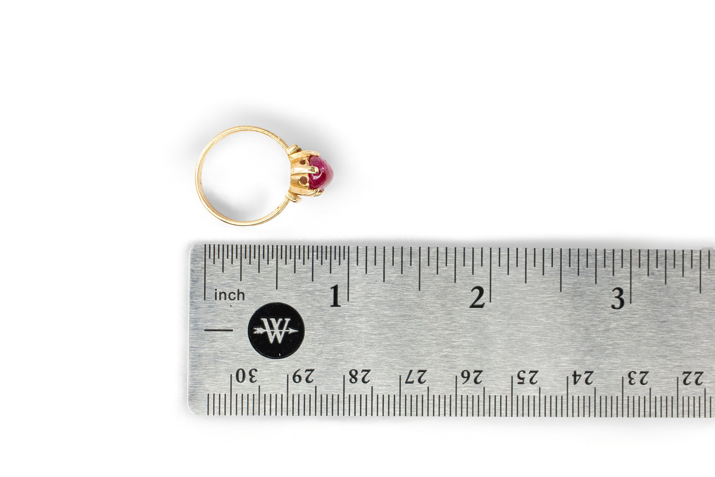 Oval Cabochon Ruby Ribbed Solitaire Ring