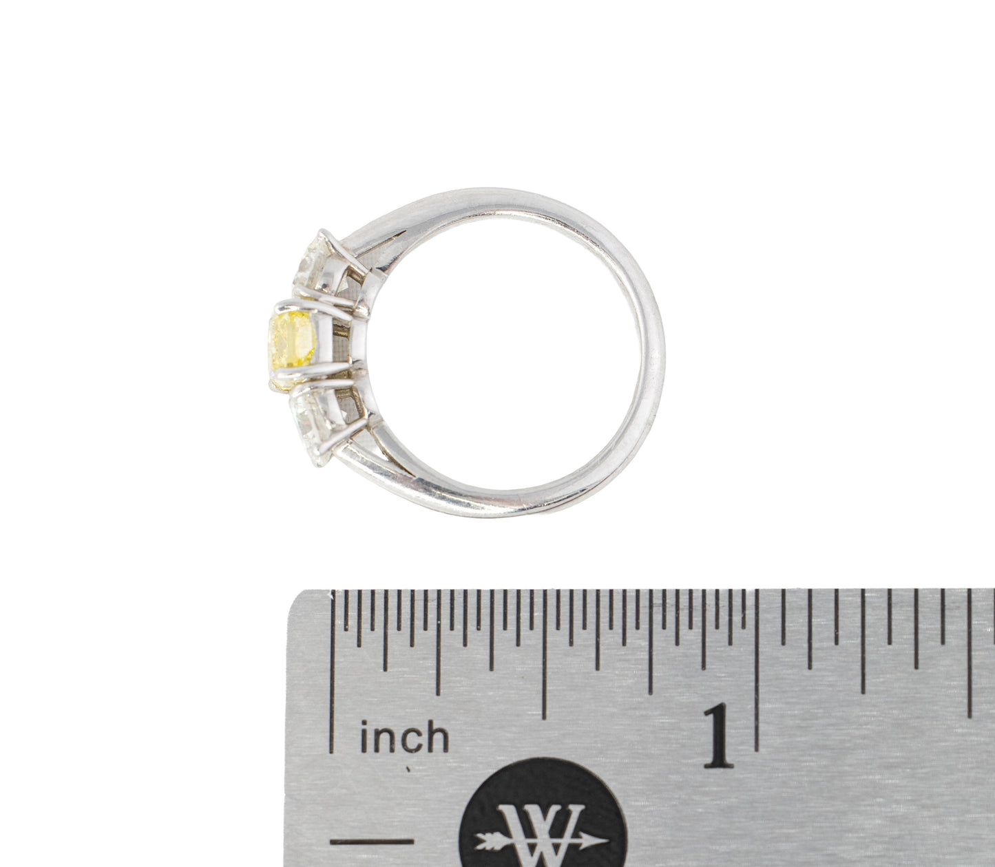 Yellow Radiant Cut Diamond and Round Diamond Three-Stone Platinum