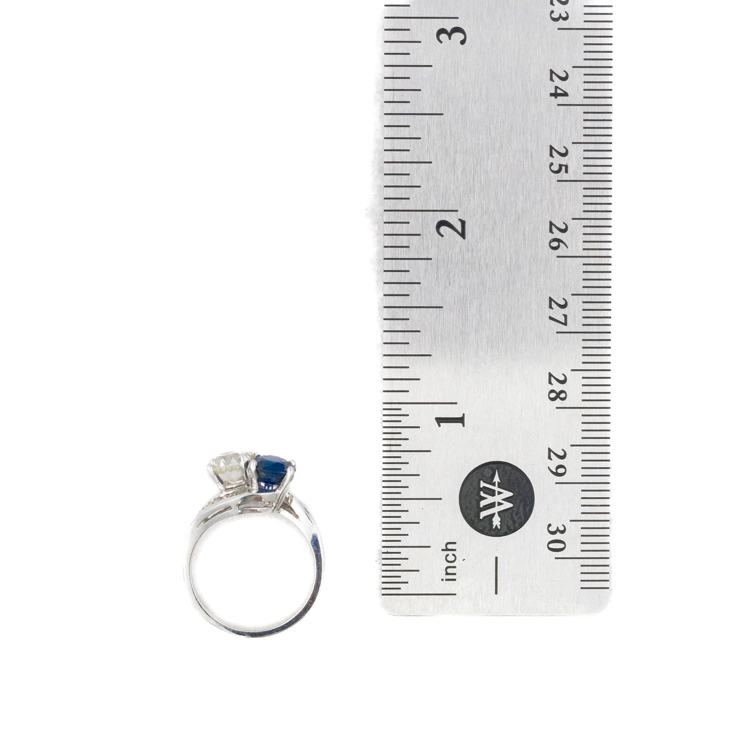 Sapphire and Diamond Bypass Baguette Cut Diamond Ring