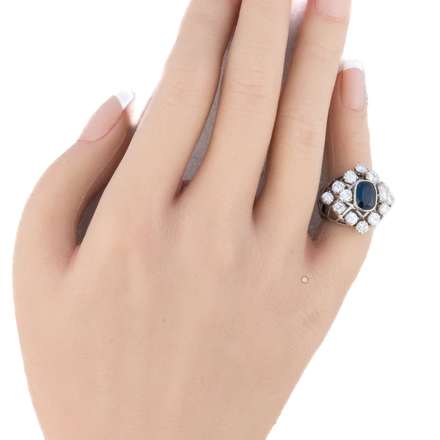 Oval Cut Sapphire and Diamond Dome Ring
