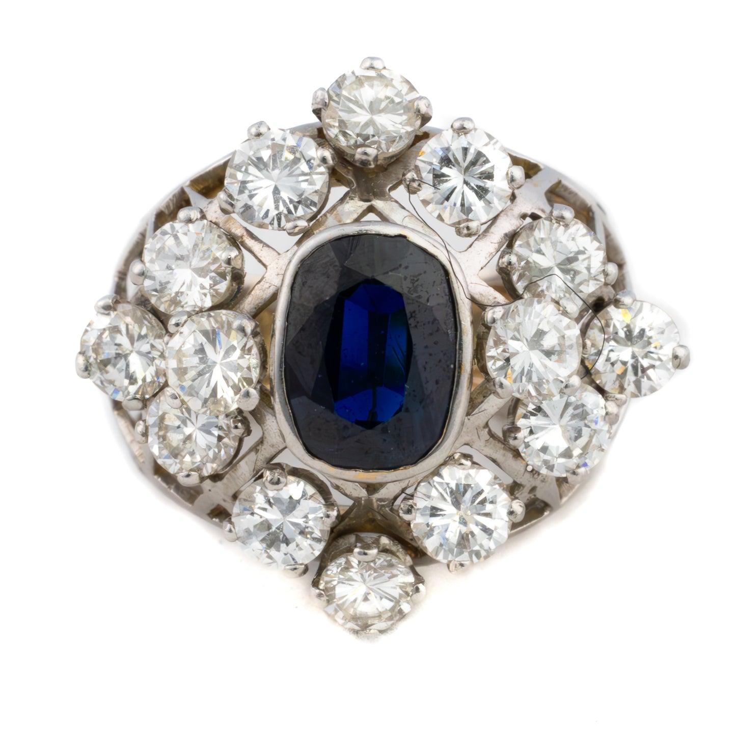 Oval Cut Sapphire and Diamond Dome Ring
