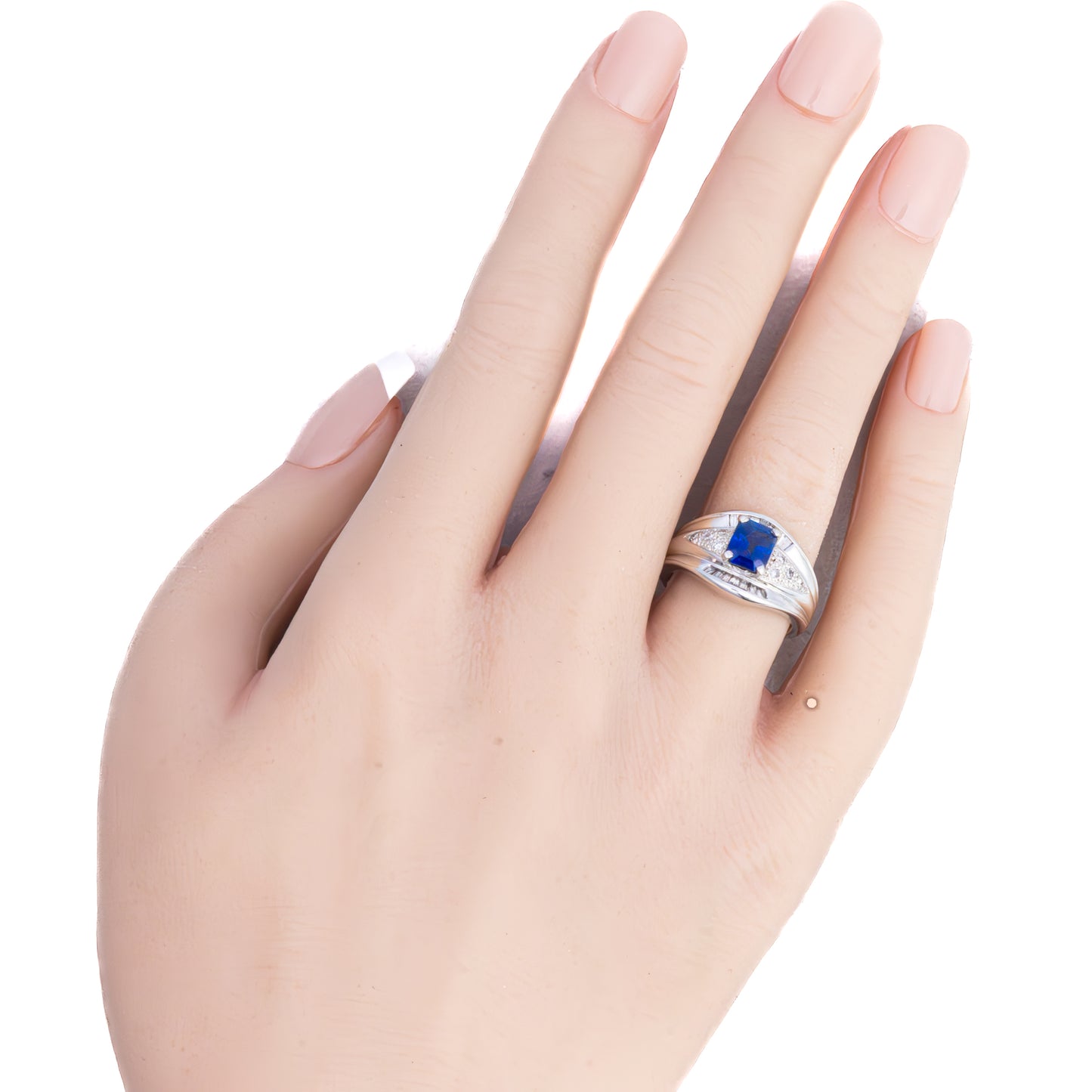 Platinum Emerald Cut Sapphire and Diamond Dome Ring