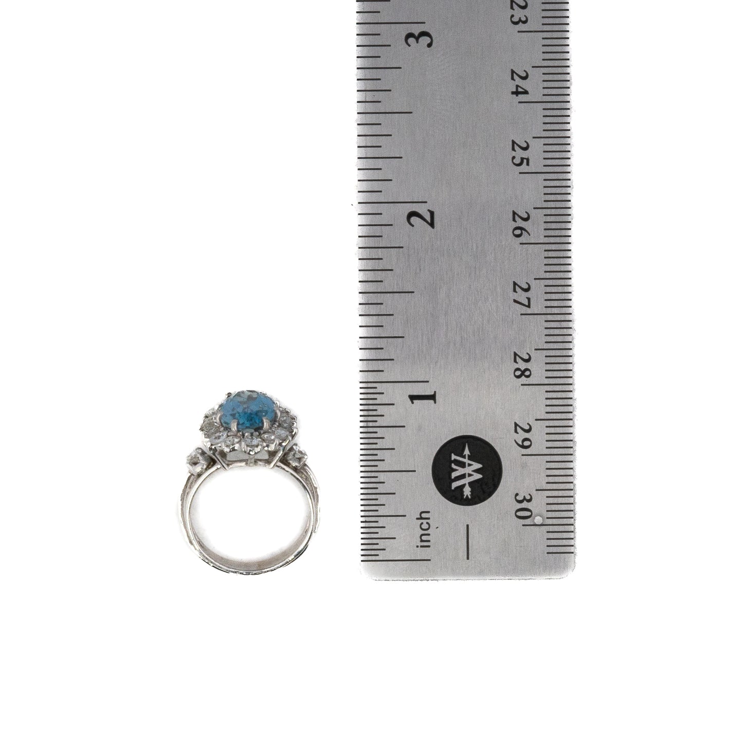 Oval Cut Aquamarine and Brilliant Cut Diamond Halo Ring