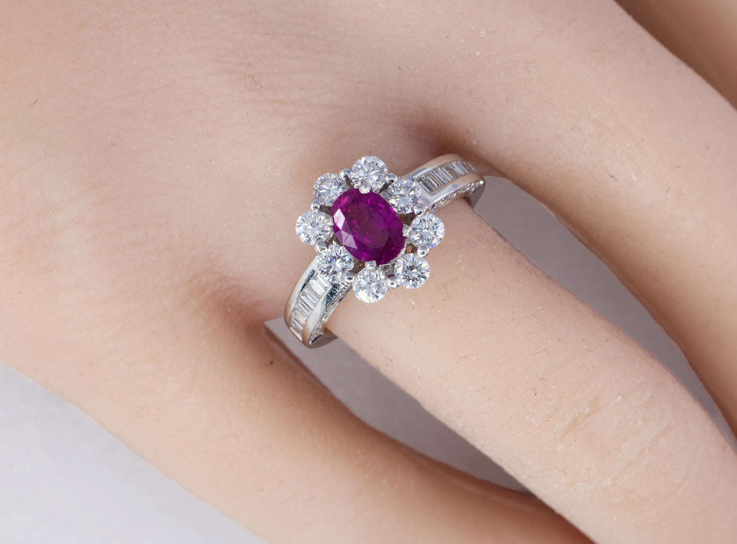 Oval Ruby and Multi-Cut Diamond Halo Ring