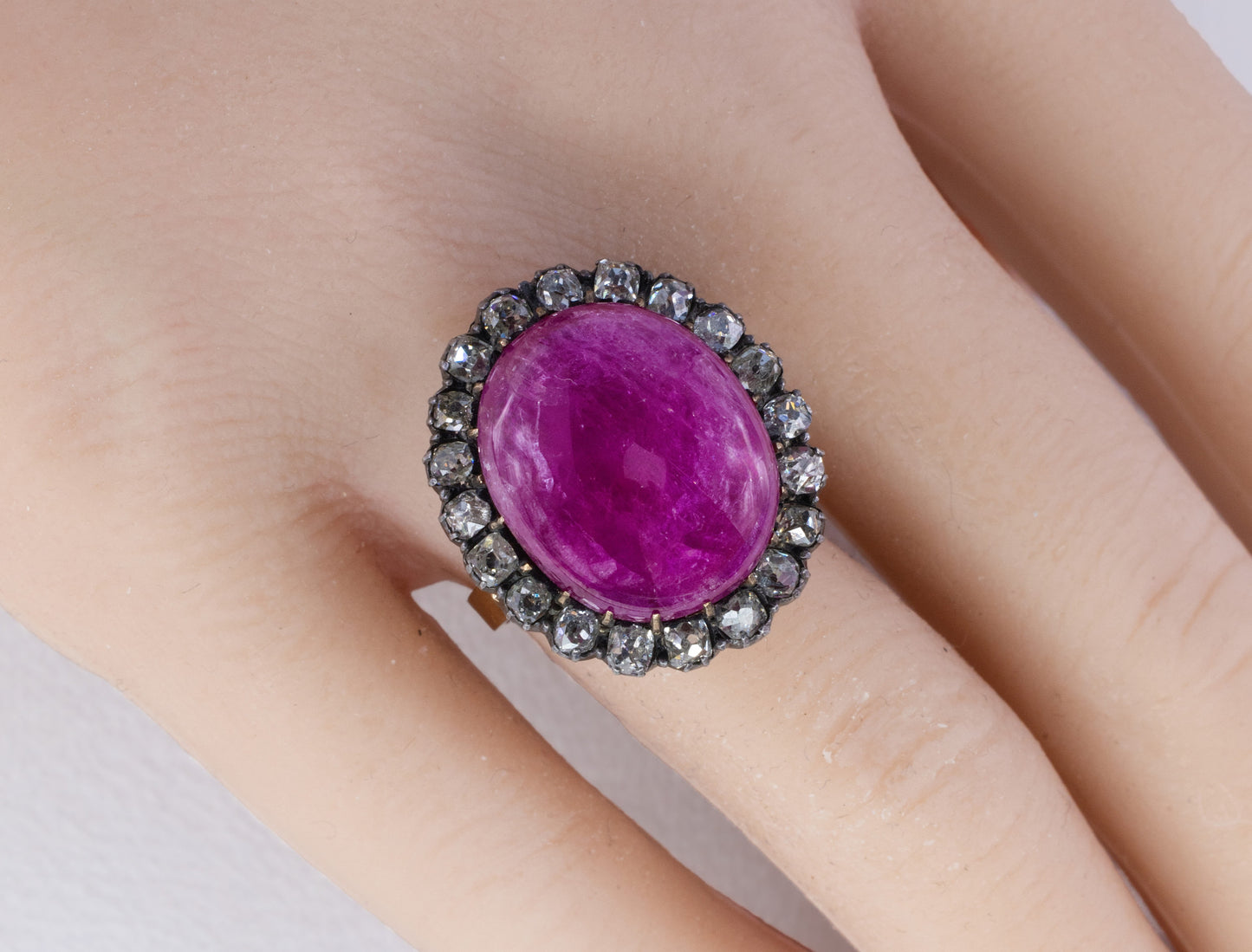 Large Cabochon Ruby and Old Mine Diamond Halo Ring