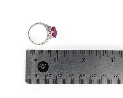 Oval Ruby and Diamond Accent Floral Filigree Ring