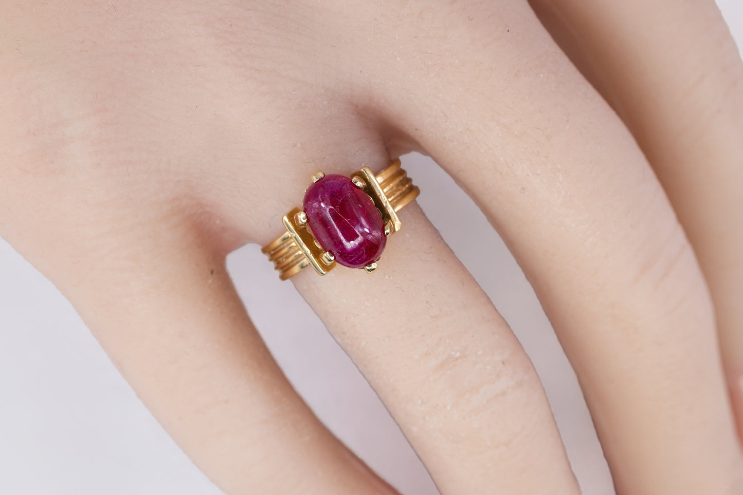 Oval Cabochon Ruby Ribbed Solitaire Ring