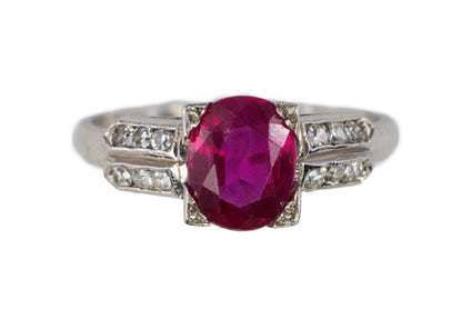 Platinum Oval Ruby and Split-Shoulder Diamond Ring