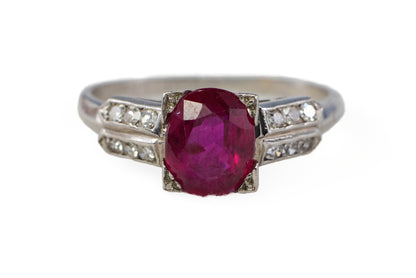 Platinum Oval Ruby and Split-Shoulder Diamond Ring