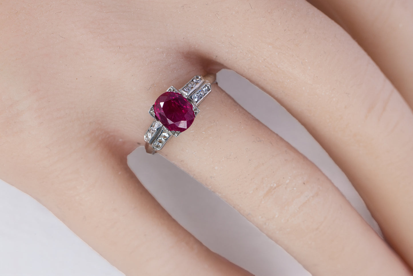 Platinum Oval Ruby and Split-Shoulder Diamond Ring