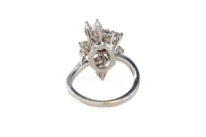 White Gold Oval Ruby and Asymmetrical Floral Diamond Cluster Ring