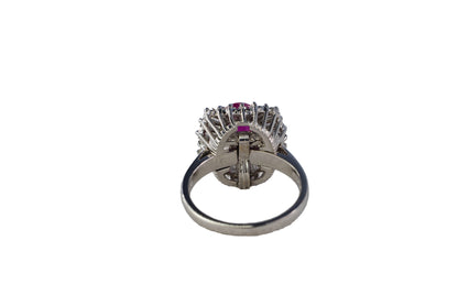 Platinum Oval Ruby and Tapered Baguette Ballerina Cluster Ring