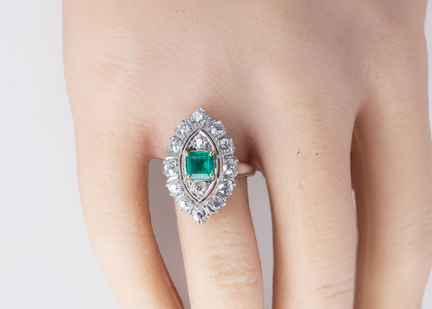 Platinum Marquise-Shaped Emerald and Old Mine Cut Diamond Cluster Ring
