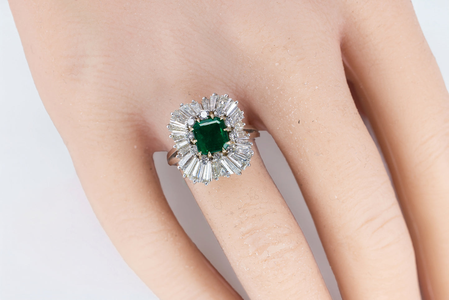Platinum Emerald-Cut Emerald and Double-Halo Ballerina Ring