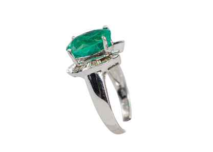 Oval Emerald and Baguette Diamond Horseshoe Bypass Ring