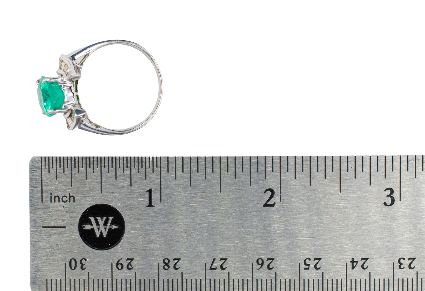 Oval Emerald and Baguette Diamond Horseshoe Bypass Ring