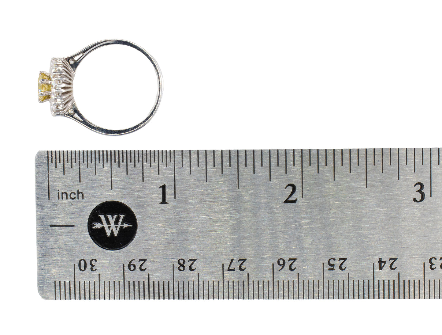 Fancy Yellow Diamond and White Diamond Halo Ring