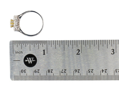 Fancy Yellow Diamond and White Diamond Halo Ring