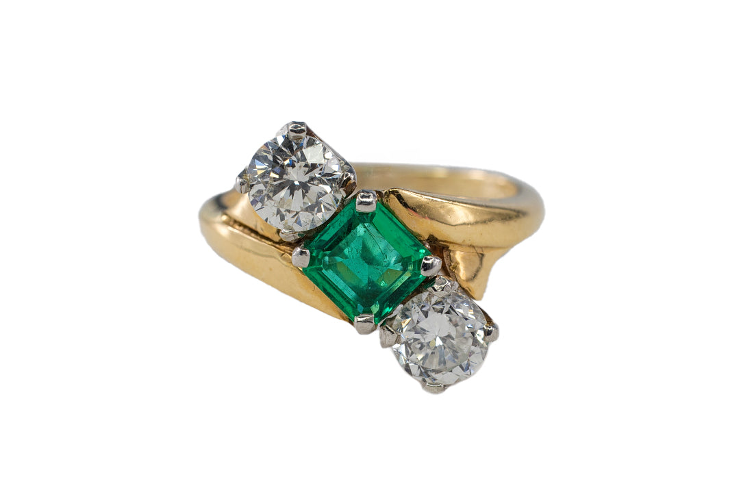 Yellow Gold and Platinum Square-Cut Emerald and Diamond Three-Stone Bypass Ring