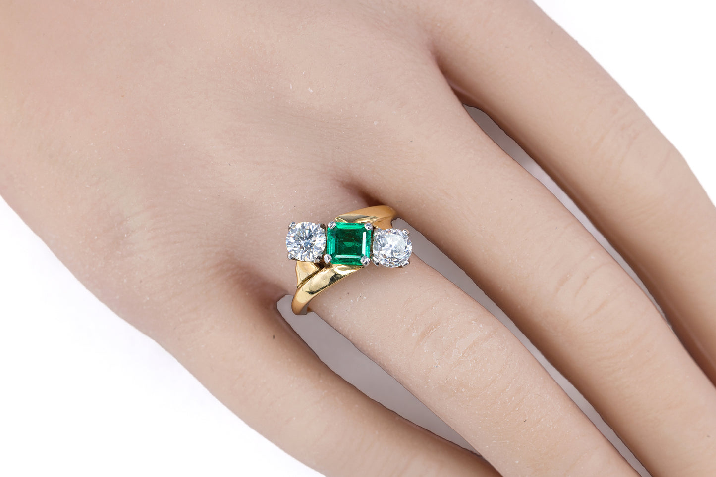 Yellow Gold and Platinum Square-Cut Emerald and Diamond Three-Stone Bypass Ring