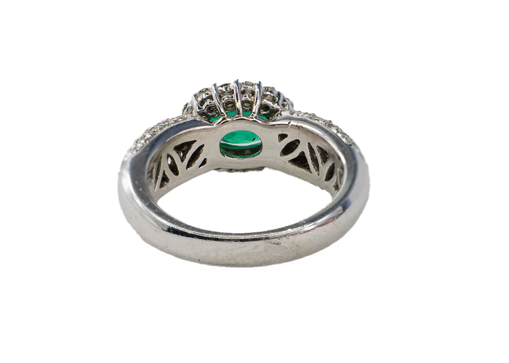 Platinum Oval Emerald and Multi-Row Pavé Diamond Halo Ring