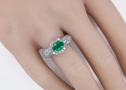 Platinum Oval Emerald and Multi-Row Pavé Diamond Halo Ring