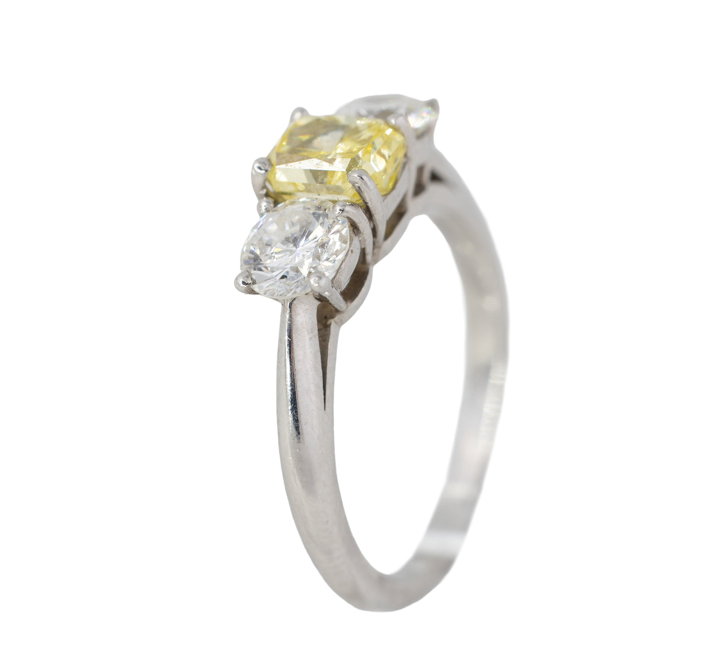 Yellow Radiant Cut Diamond and Round Diamond Three-Stone Platinum