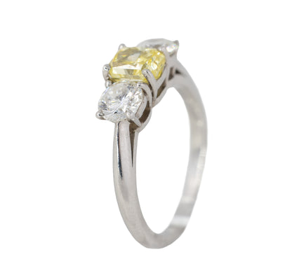 Yellow Radiant Cut Diamond and Round Diamond Three-Stone Platinum