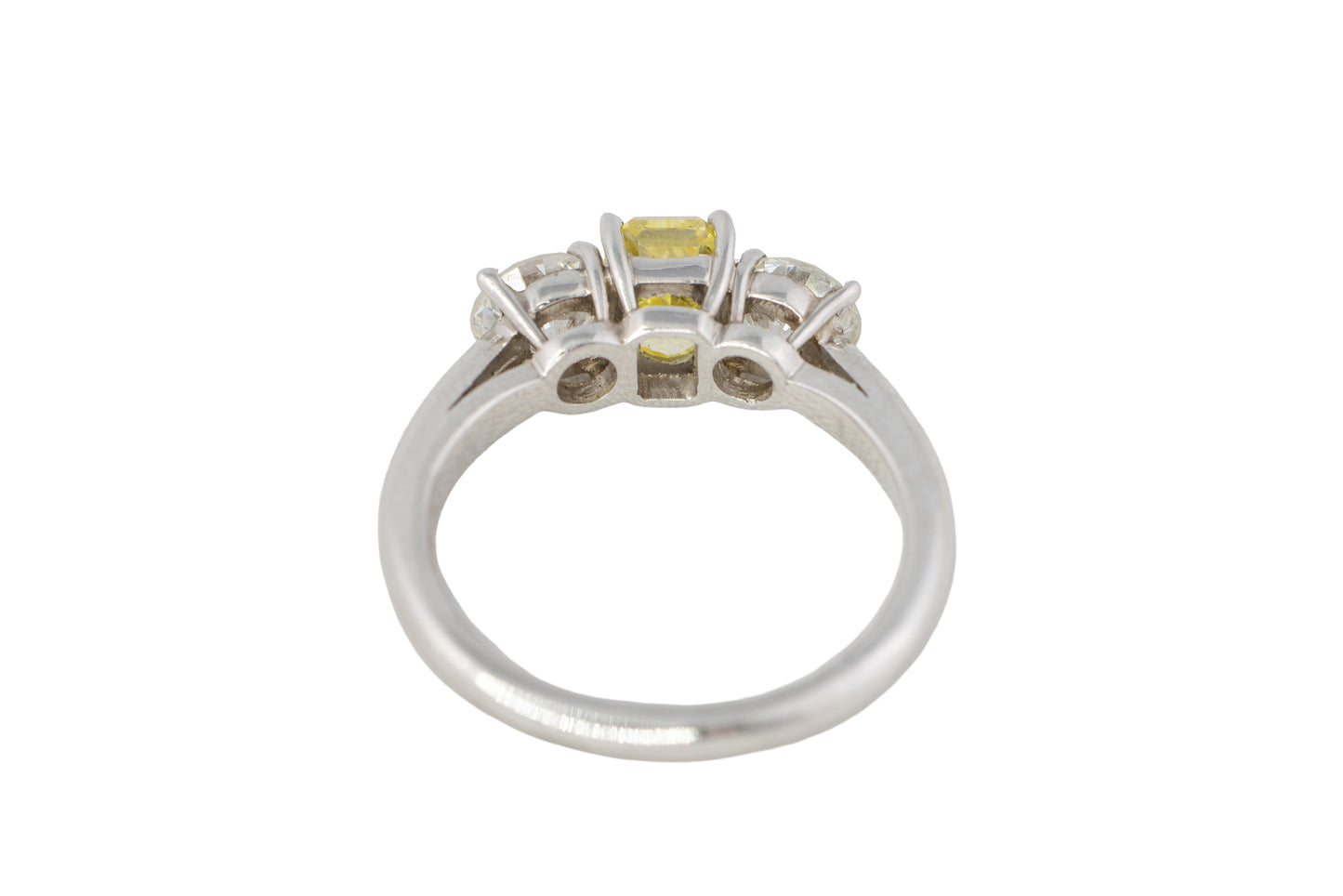 Yellow Radiant Cut Diamond and Round Diamond Three-Stone Platinum