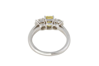 Yellow Radiant Cut Diamond and Round Diamond Three-Stone Platinum