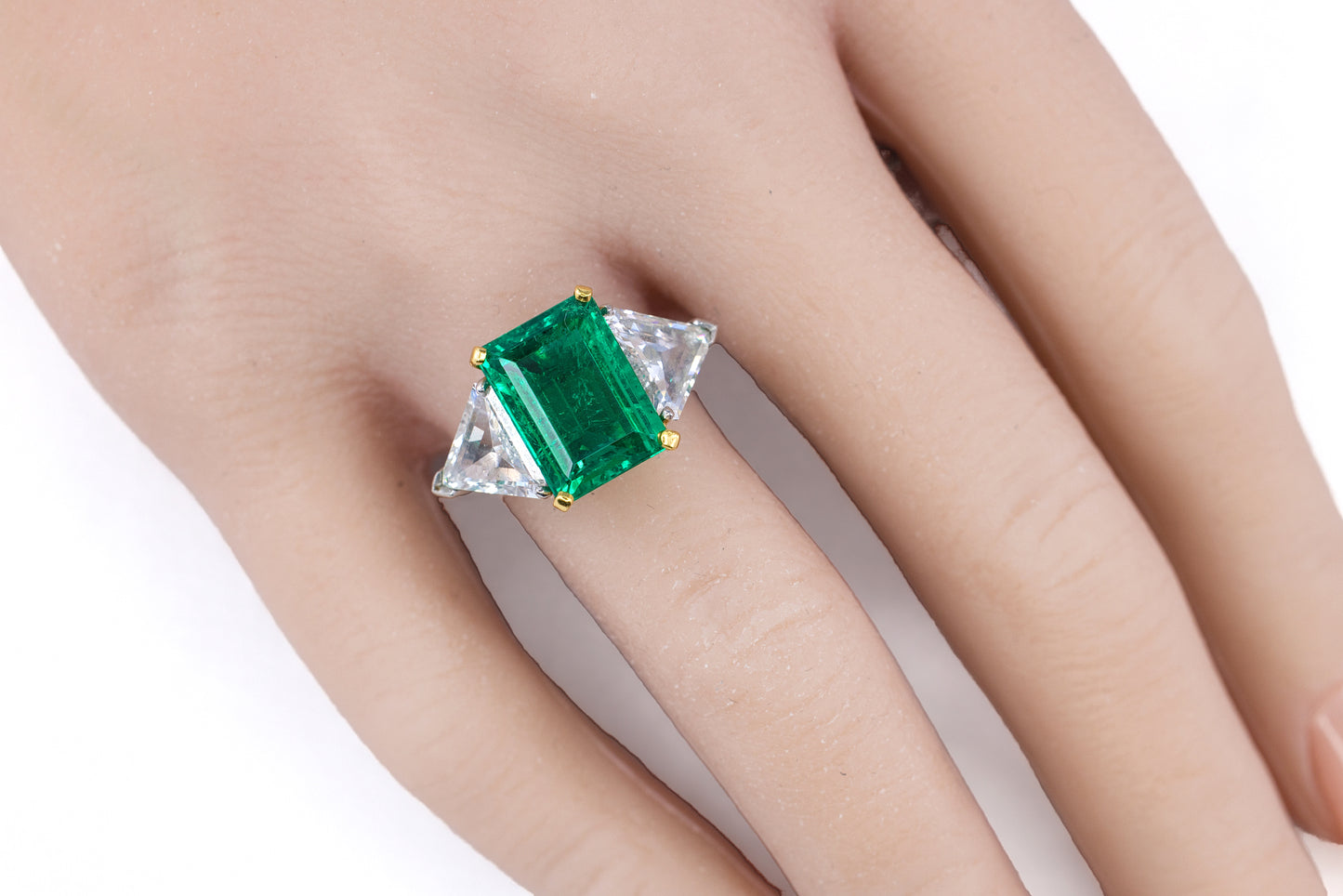 Platinum & Yellow Gold Emerald-Cut Emerald Trillion Cut Diamond Three-Stone Ring