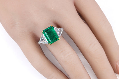 Platinum & Yellow Gold Emerald-Cut Emerald Trillion Cut Diamond Three-Stone Ring