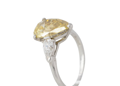 Fancy Yellow Pear Diamond Three-Stone Ring with Pear Diamond Accents