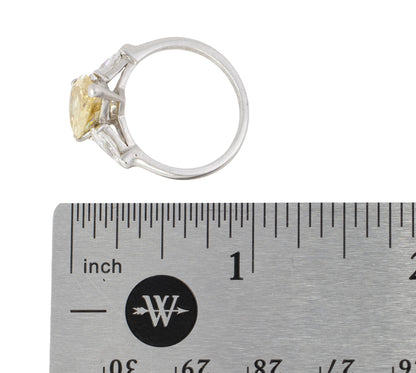 Fancy Yellow Pear Diamond Three-Stone Ring with Pear Diamond Accents