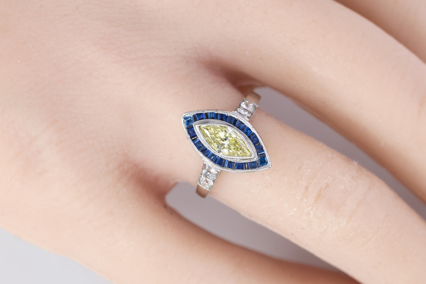 Marquise Yellow Diamond with Sapphire Halo and Diamond Shoulders