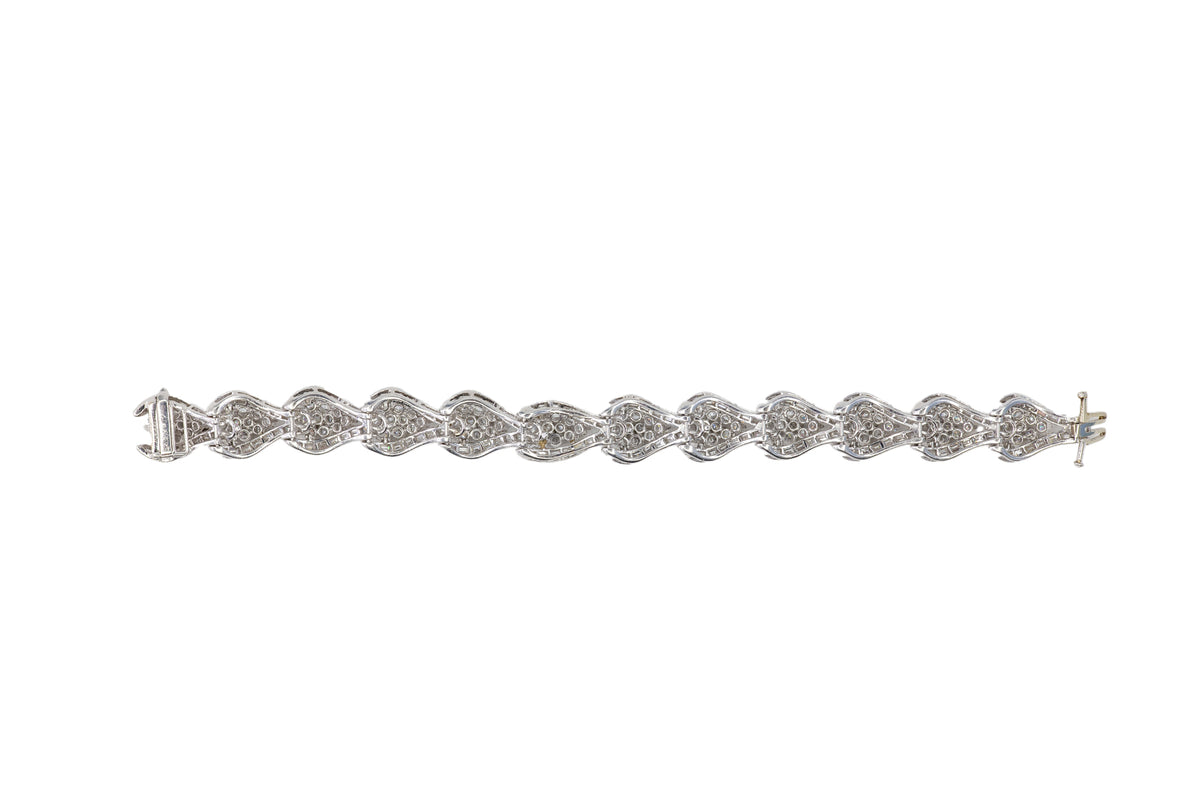 Platinum Wave Scroll Diamond Link Statement Bracelet