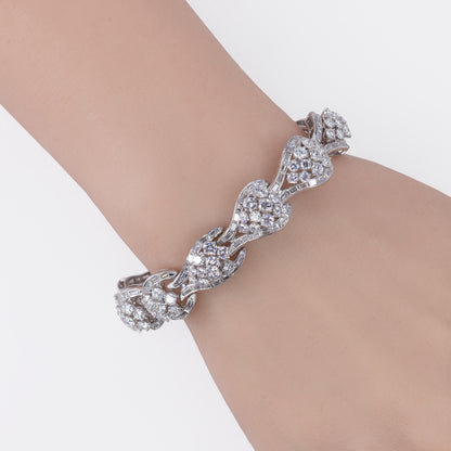 Platinum Wave Scroll Diamond Link Statement Bracelet