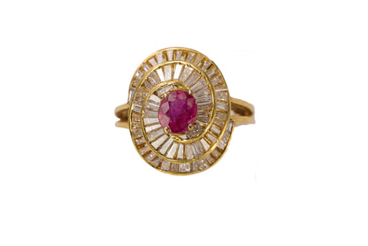 Gold Oval Ruby and Swirling Baguette Diamond Ballerina Ring