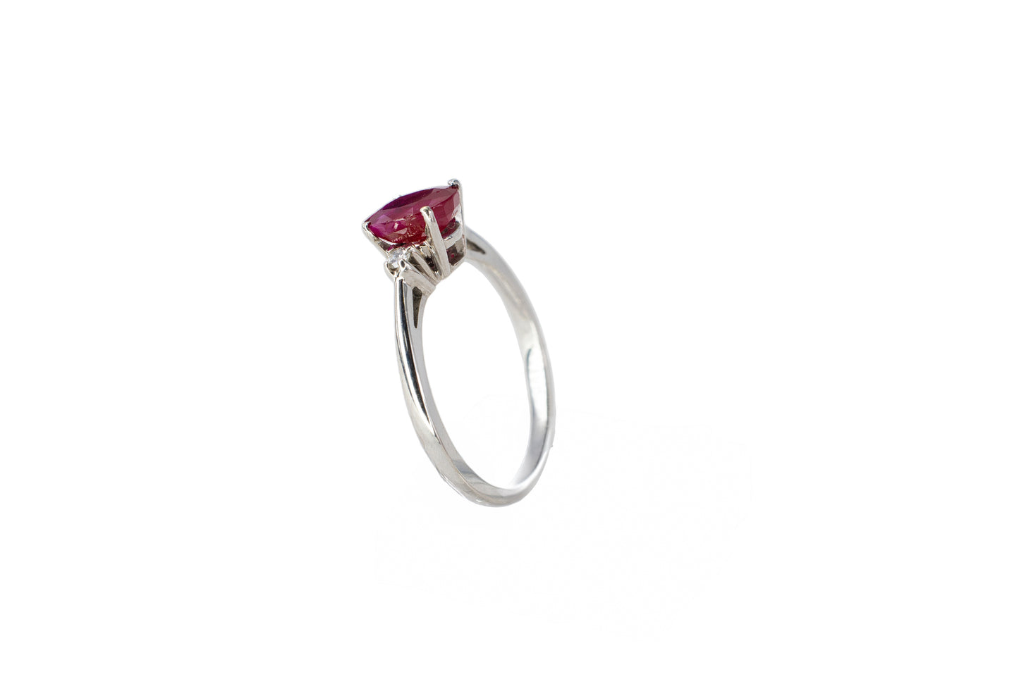 White Gold Oval Ruby Three-Stone Solitaire Ring