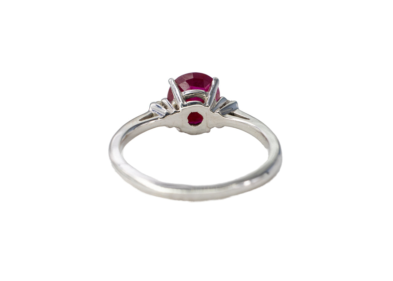 White Gold Oval Ruby Three-Stone Solitaire Ring