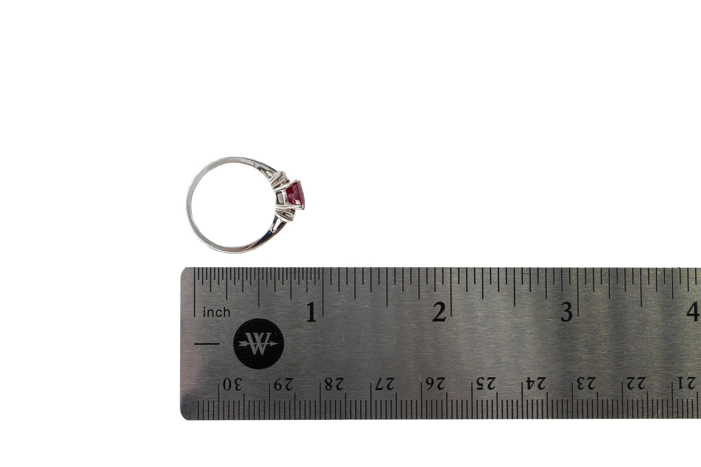 White Gold Oval Ruby Three-Stone Solitaire Ring