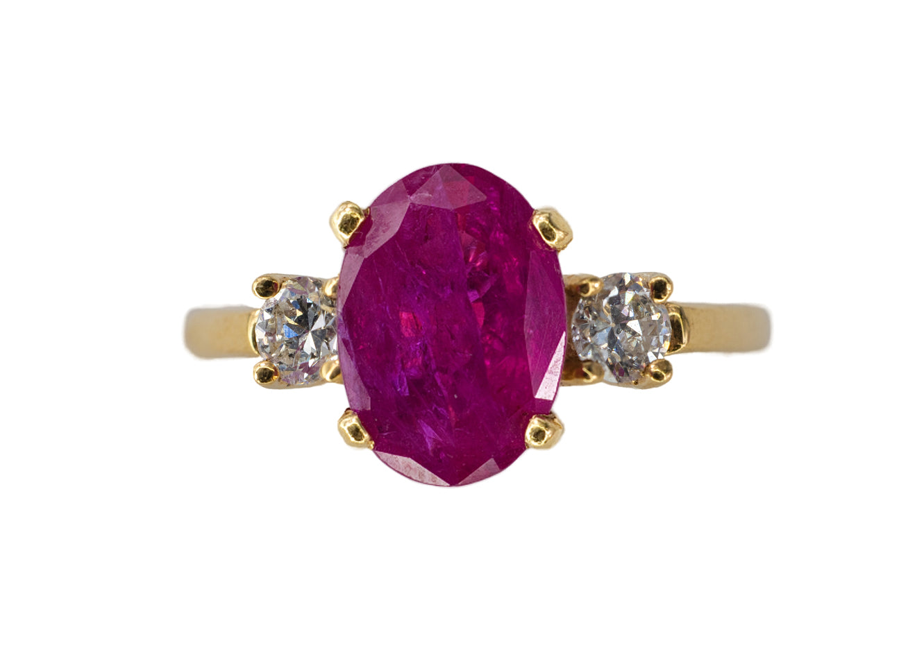 Gold Oval Ruby and Three-Stone Diamond Ring