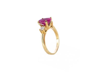 Gold Oval Ruby and Three-Stone Diamond Ring