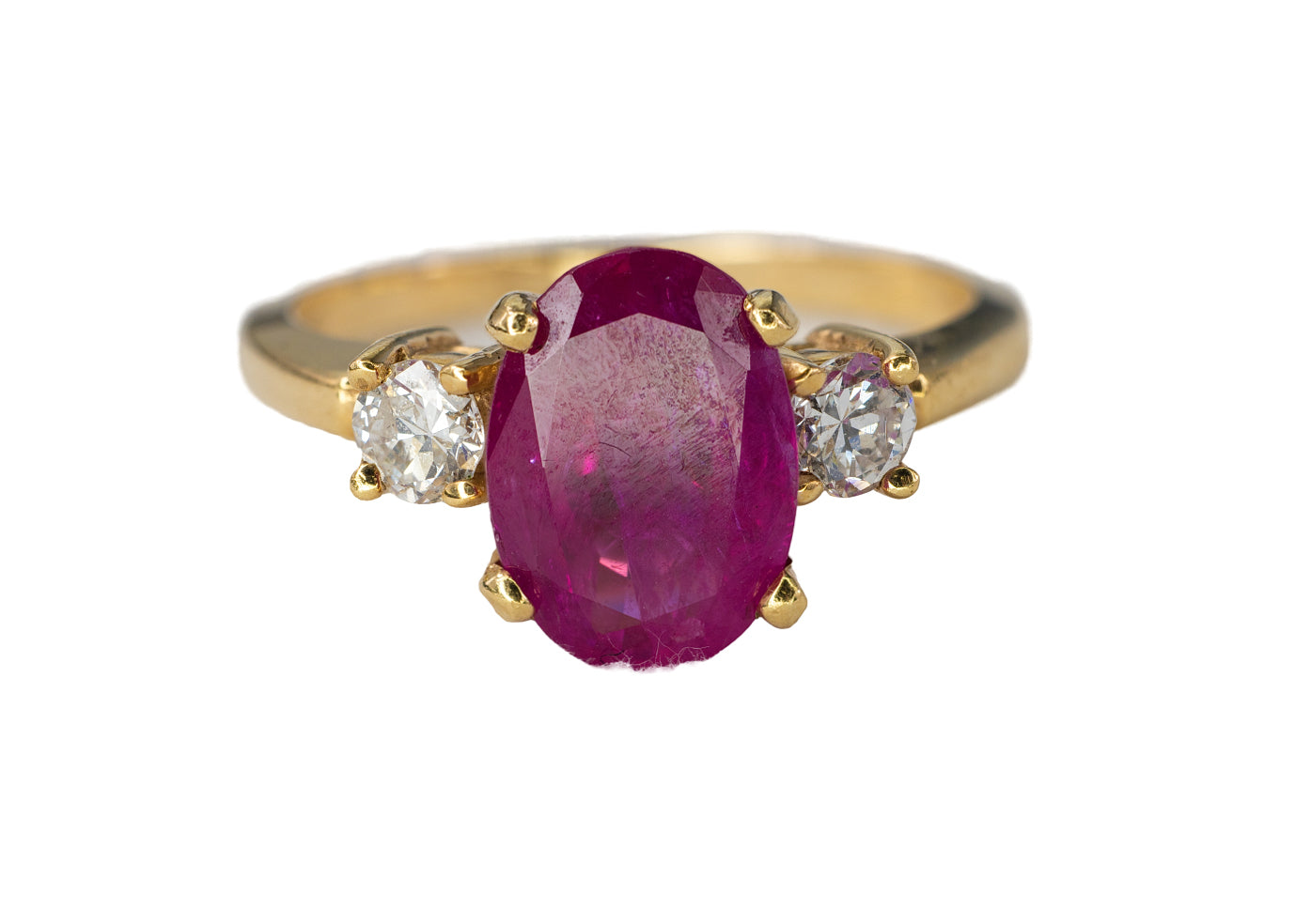 Gold Oval Ruby and Three-Stone Diamond Ring