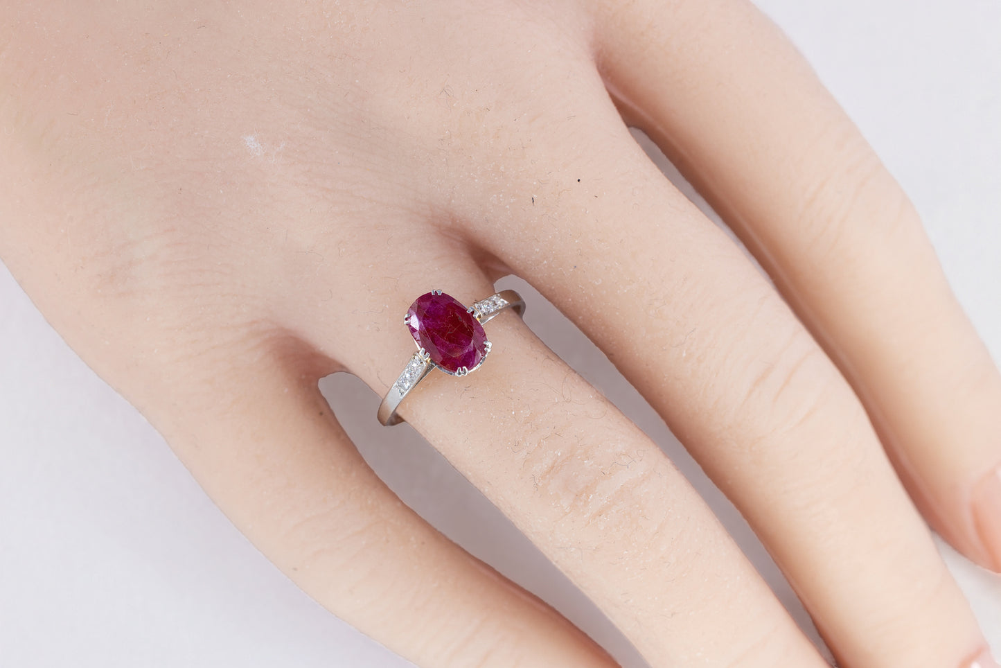 Platinum Oval Ruby Solitaire Ring with Diamond Accents