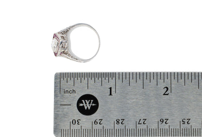 Pear-Shaped Diamond with French-Cut Ruby Halo and Diamond Ring