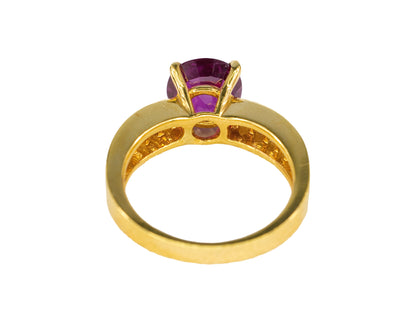 Round Ruby and Channel-Set Baguette Diamond Ring