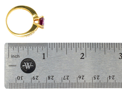 Round Ruby and Channel-Set Baguette Diamond Ring