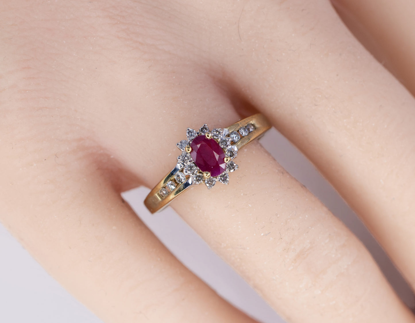 Oval Ruby and Diamond Halo Ring